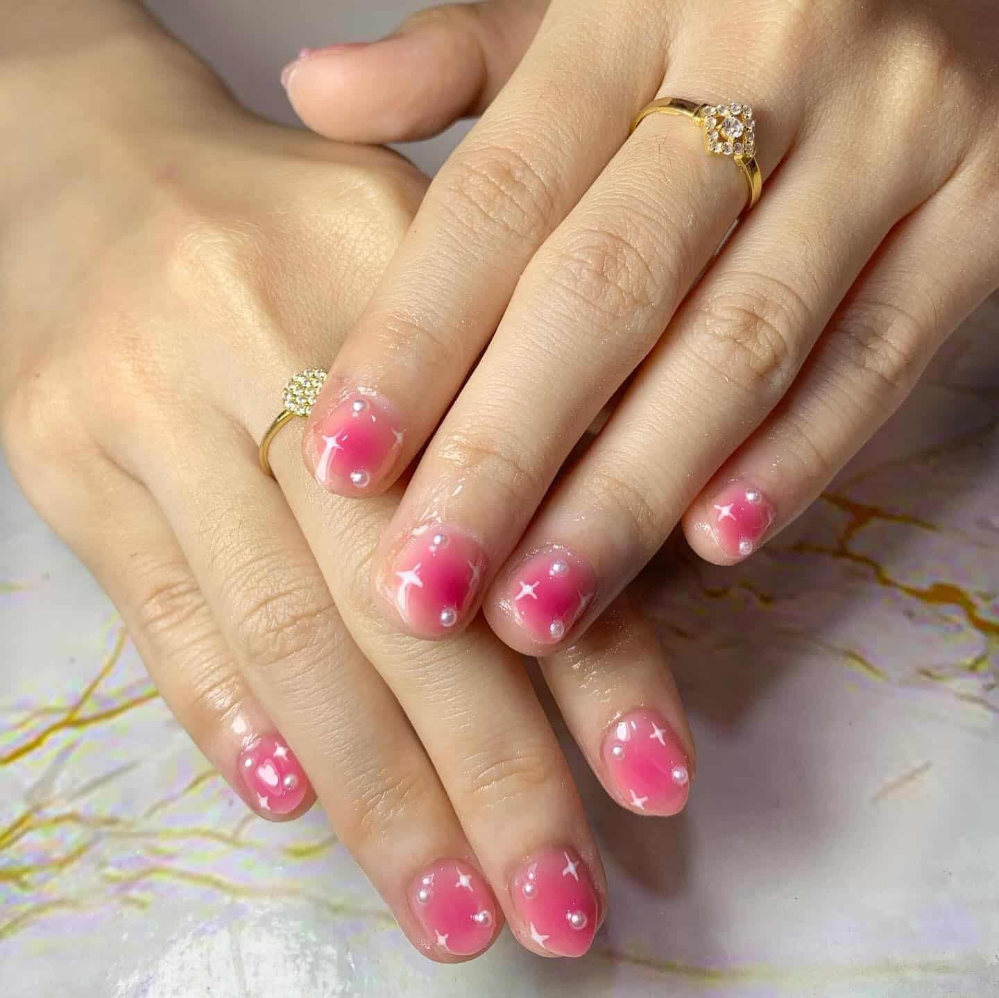 11. Bubblegum Blush Short Nails with Pearl Star Accents - blush nail ideas