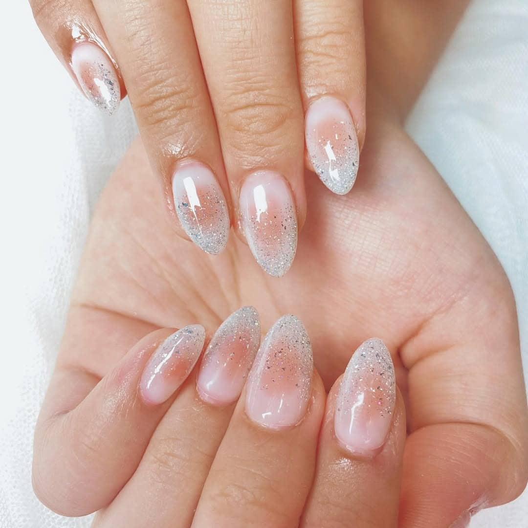 17. Icy Pink Blush Almond Nails with Silver Glitter Fade - blush nail ideas
