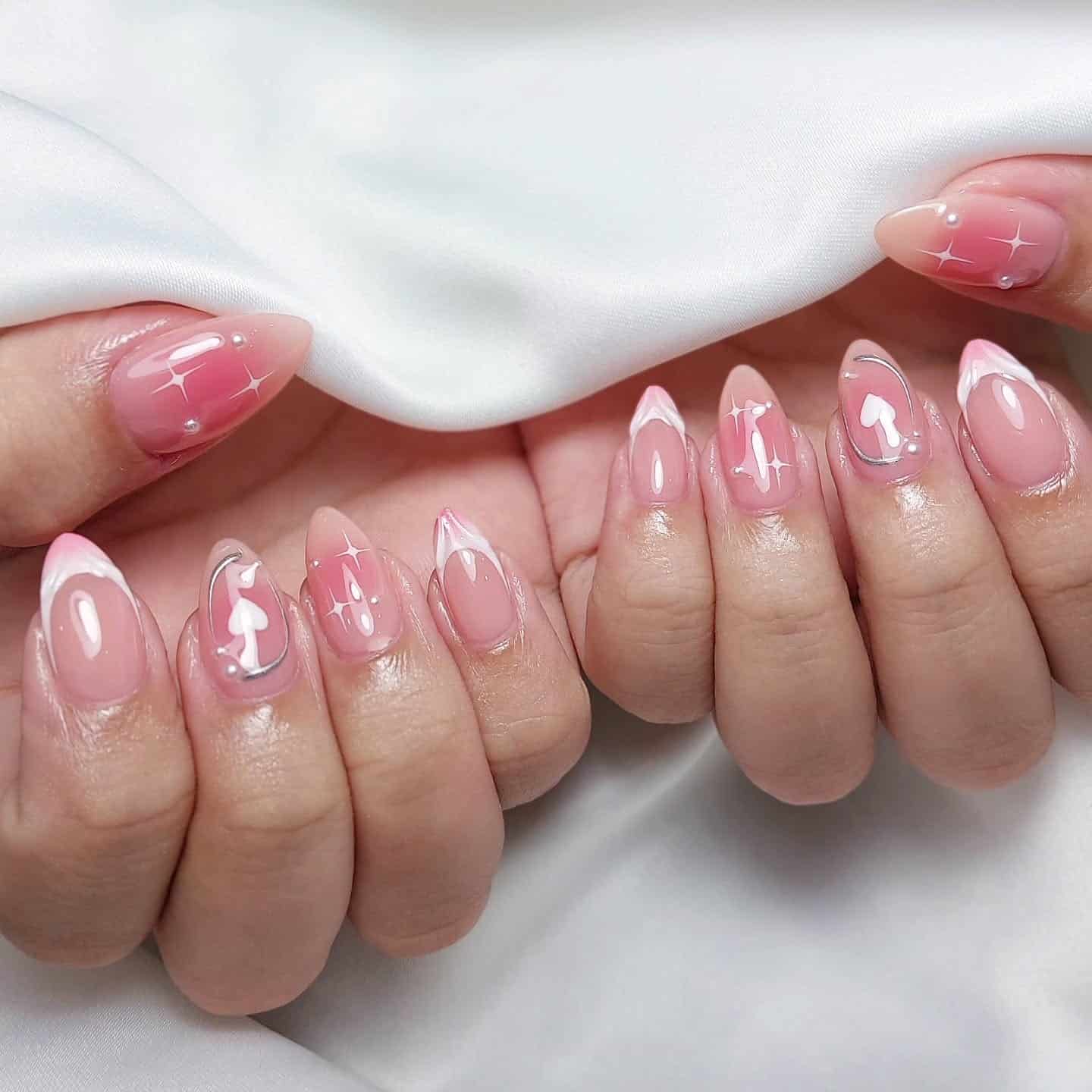 22. Soft Blush Almond Nails with White French Tips and Heart Accents - blush nail ideas