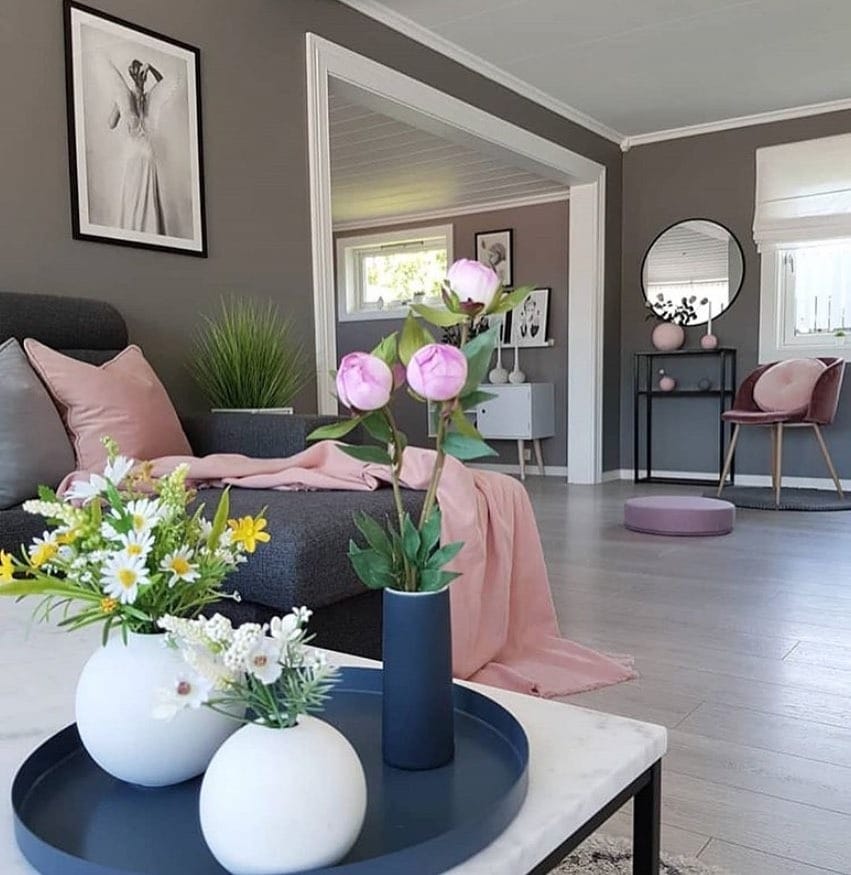 14. Deep Grey Walls with Dusty Pink Styling - grey and pink living room ideas