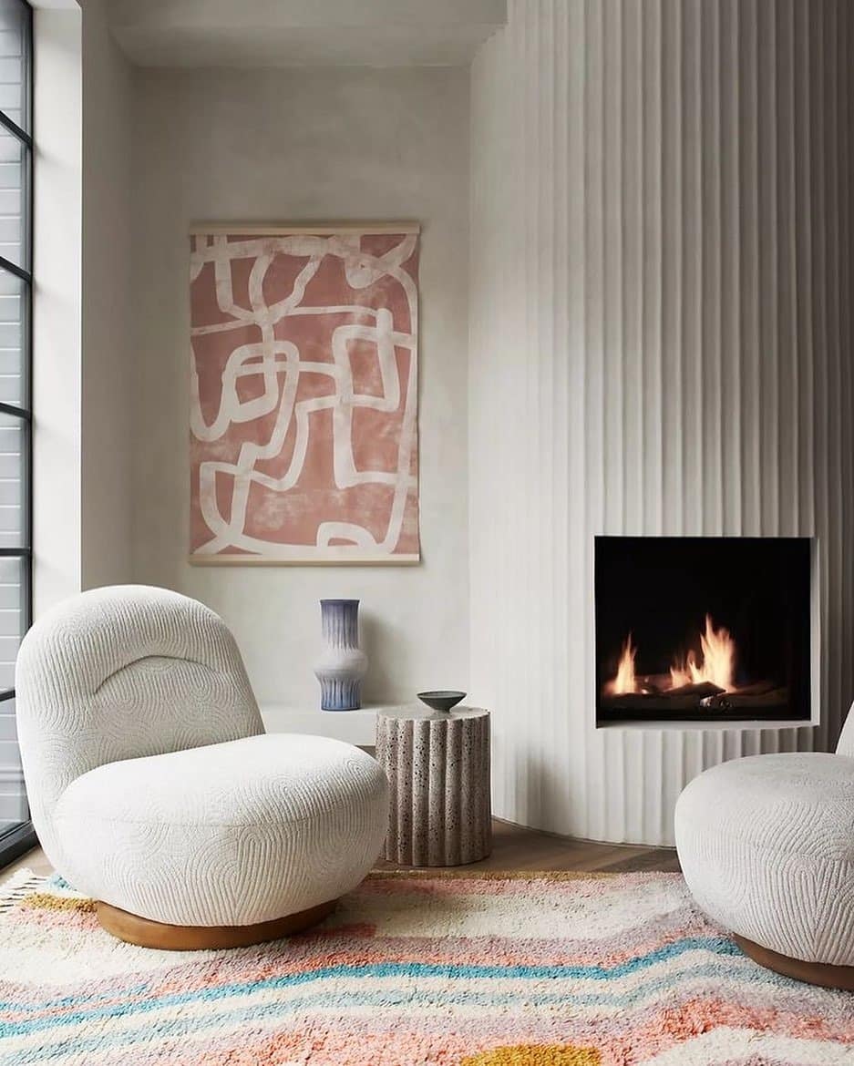 19. Minimalist Cream and Blush with Modern Fireplace - grey and pink living room ideas