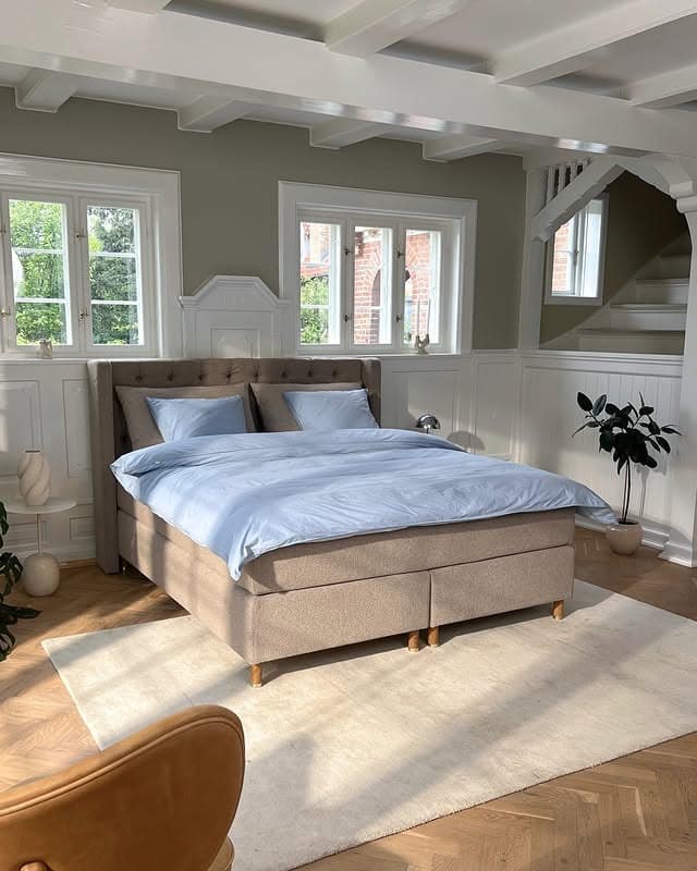 13. Warm Taupe Nordic Bedroom with Classic Paneling - scandinavian bedroom ideas