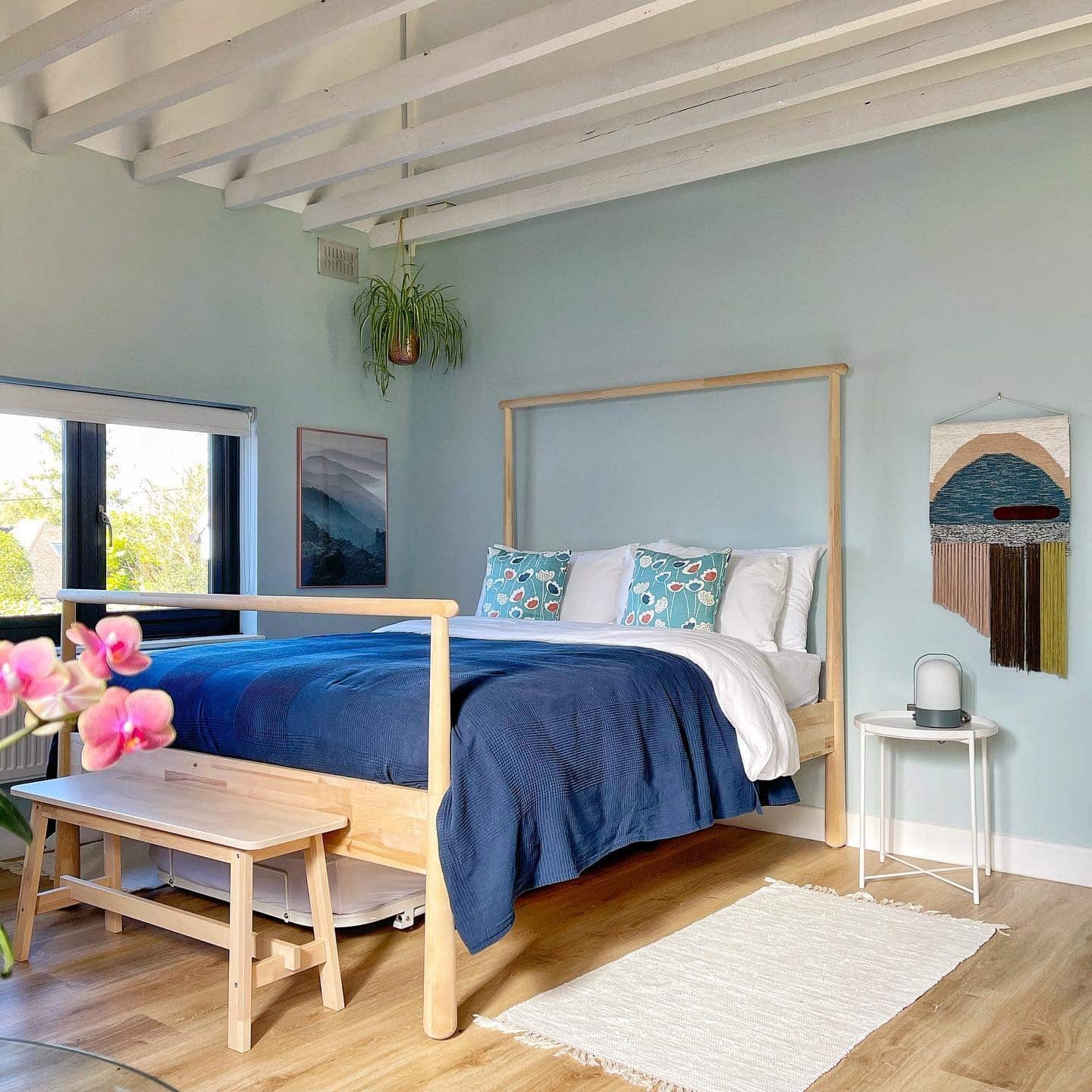 15. Soft Blue Scandinavian Bedroom with Light Oak Frame - scandinavian bedroom ideas