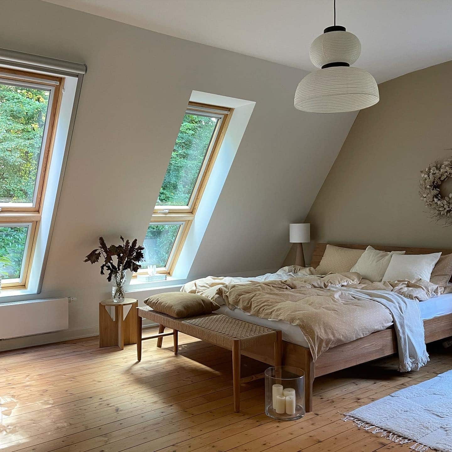 16. Attic-Style Scandinavian Bedroom in Natural Wood and Linen - scandinavian bedroom ideas