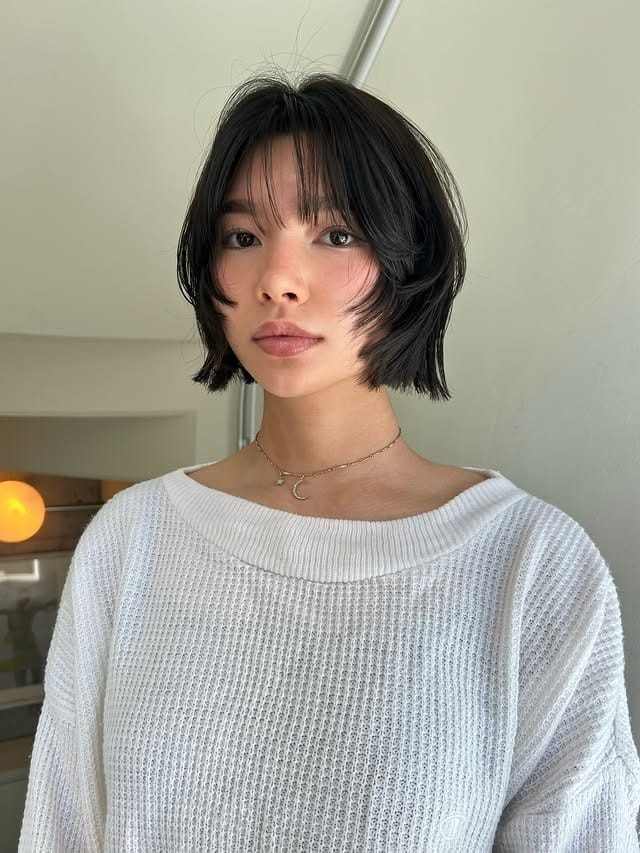 3. Textured Jet Black French Bob with Piecey Bangs - French Bob Hair