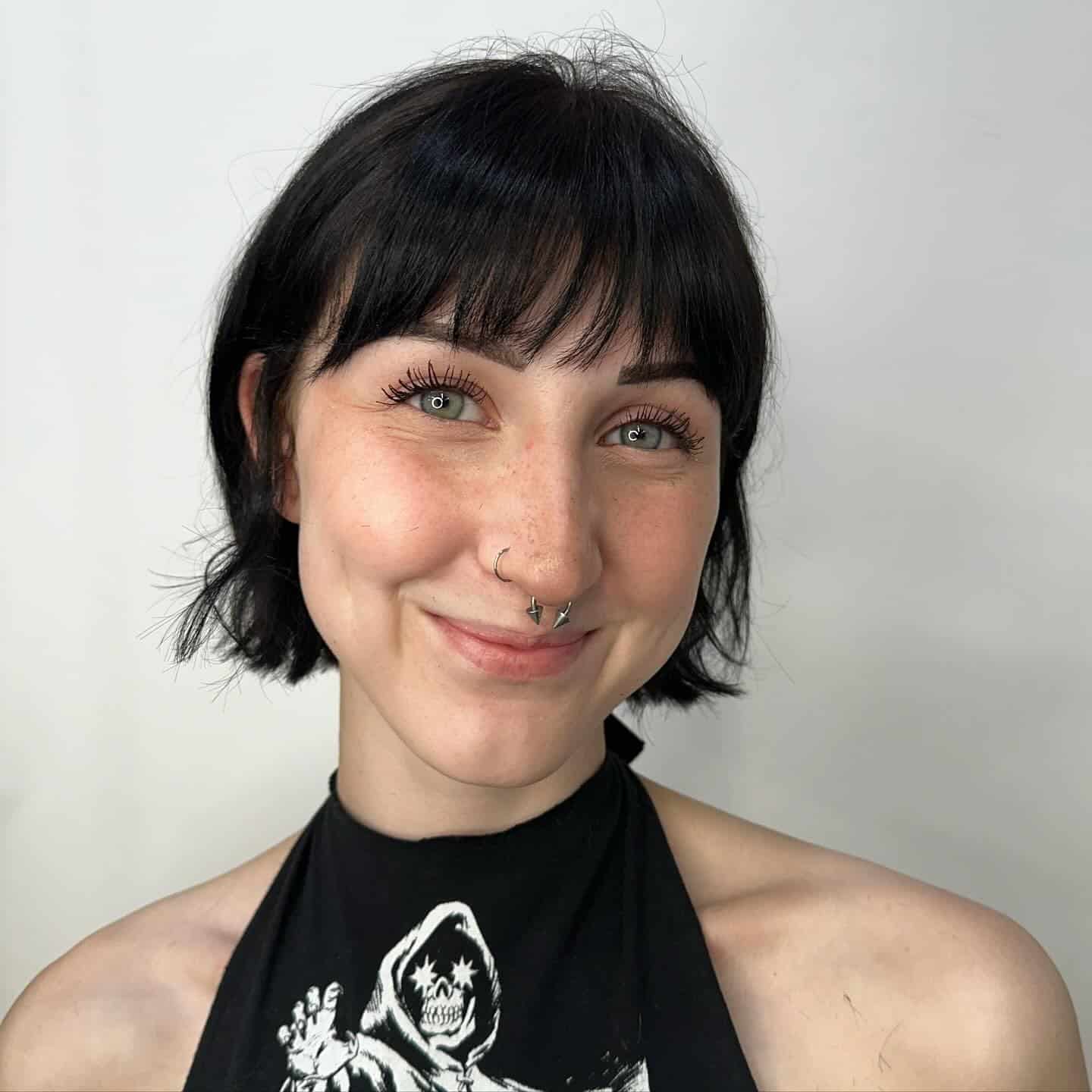 11. Soft Black French Bob with Feathered Fringe - French Bob Hair