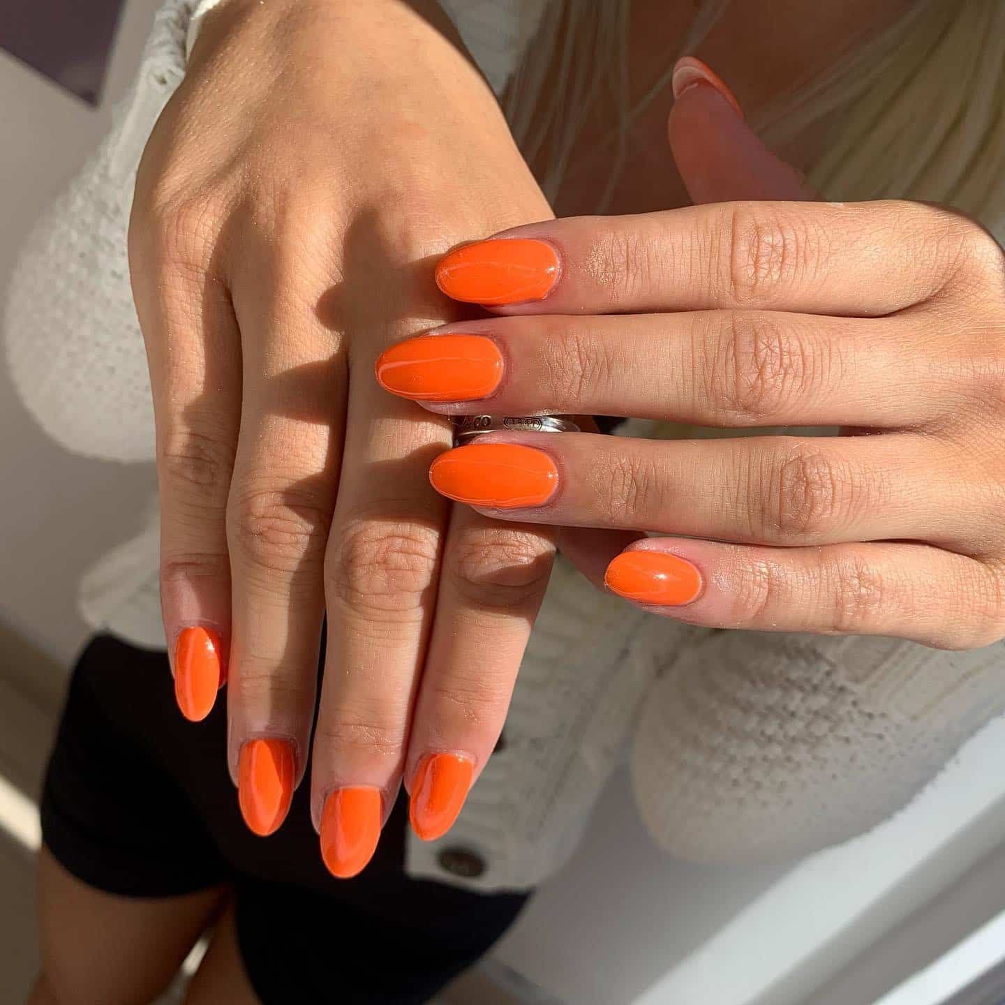 5. Short Oval Nails in High-Gloss Tangerine Orange - bright orange nail ideas