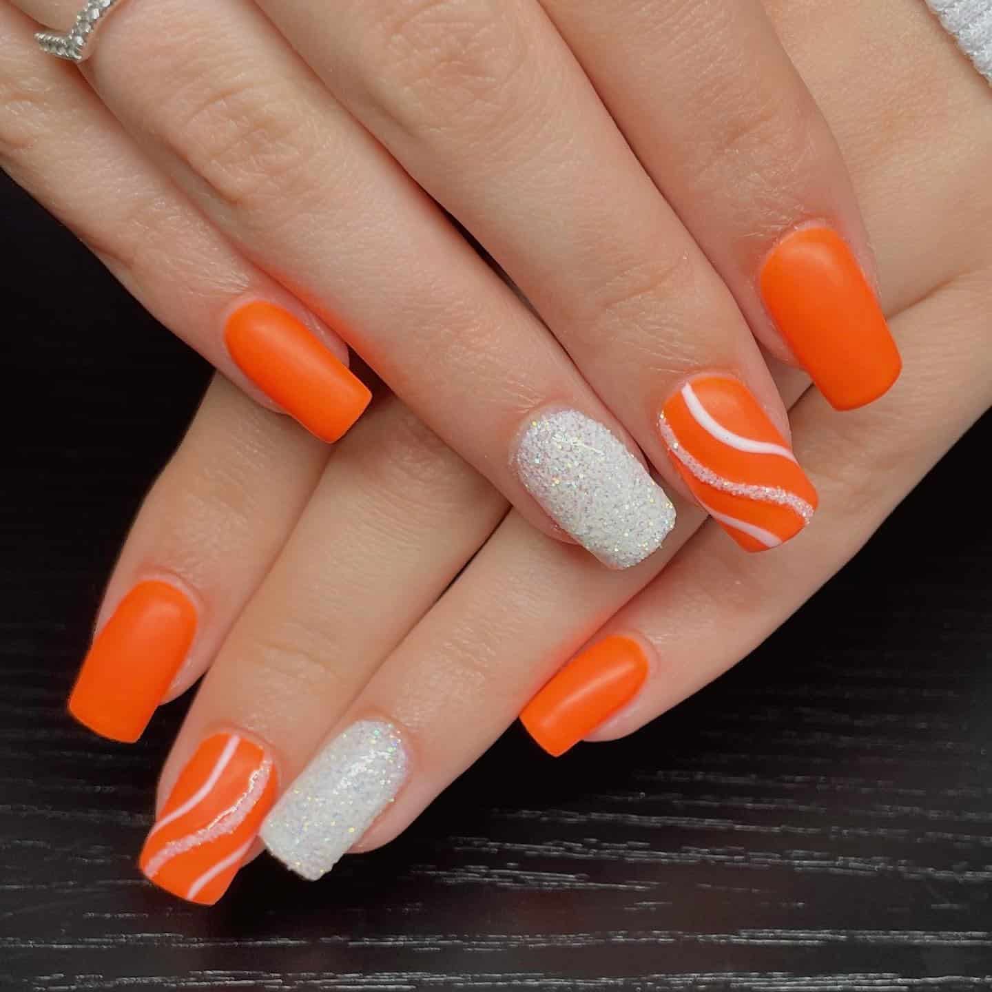 15. Matte Square Nails in Vibrant Orange with Glitter Accent - bright orange nail ideas