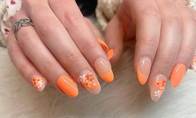 16. Almond Floral Accent Nails in Soft Orange - bright orange nail ideas