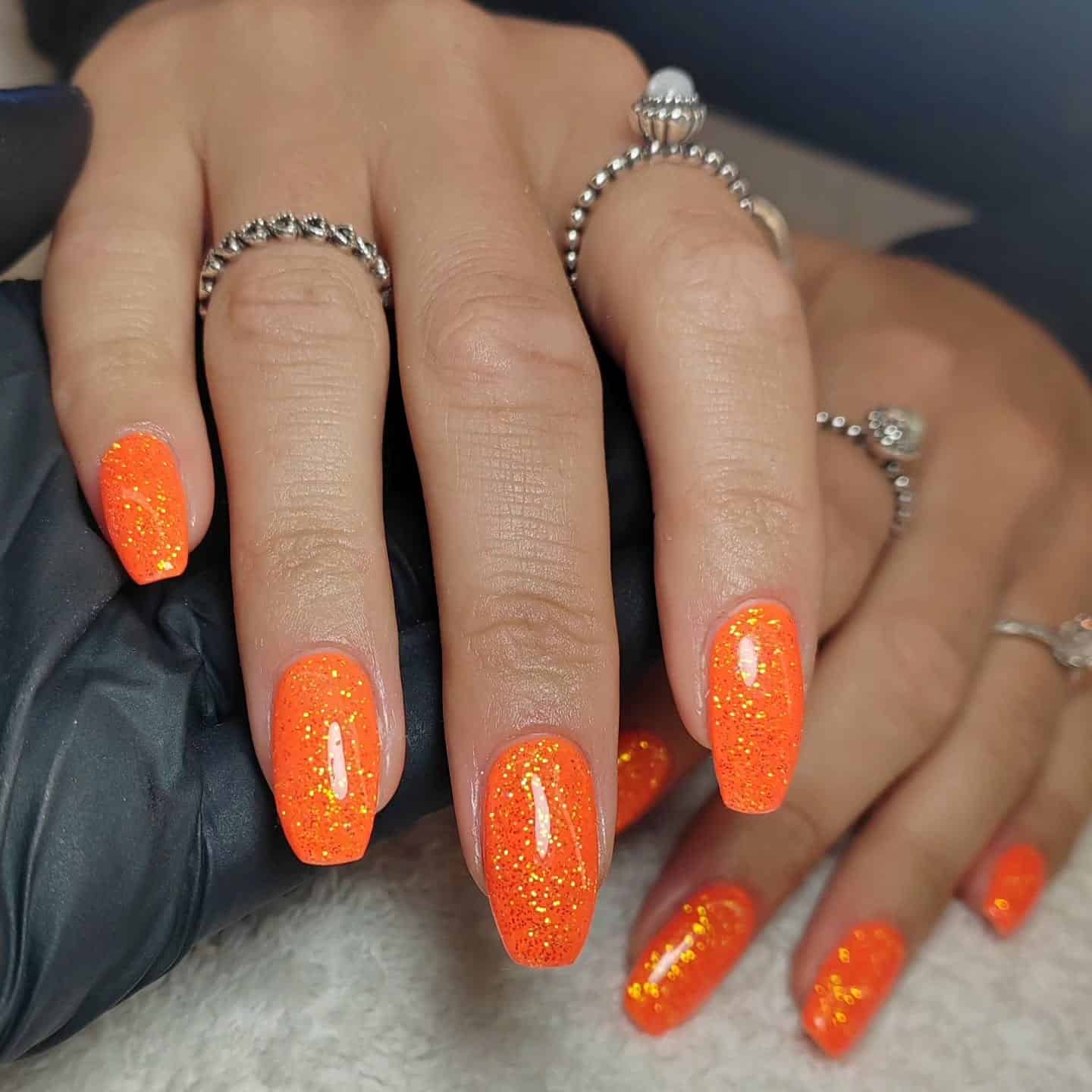 18. Glitter Coffin Nails in Sparkling Neon Orange - bright orange nail ideas