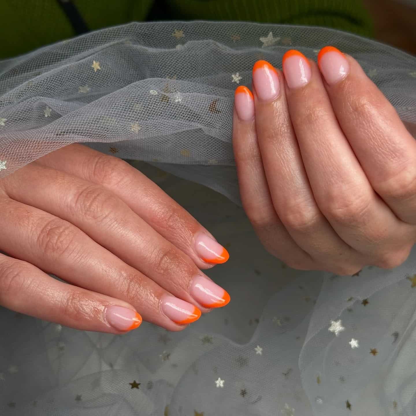 19. Soft French Almond Nails in Neon Orange - bright orange nail ideas