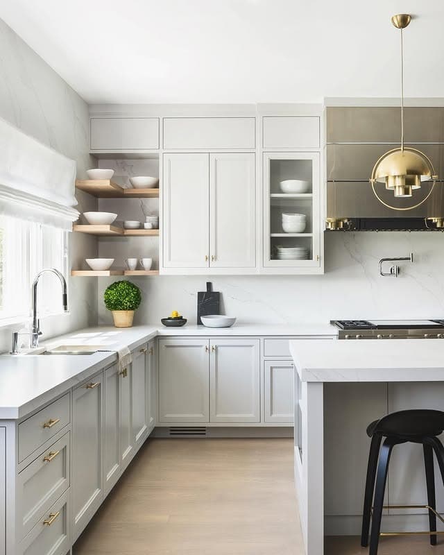 10. Light Greige Kitchen with Minimalist Brass Hardware - classic kitchen ideas