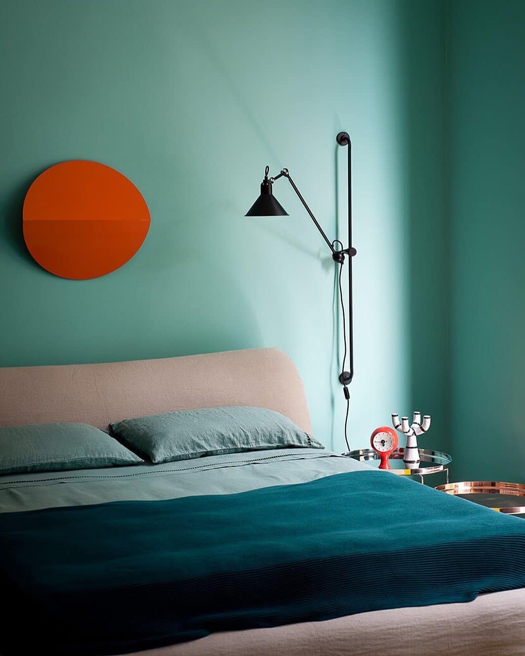 5. Minimalist Turquoise Wall with Modern Contrast - turquoise bedroom ideas