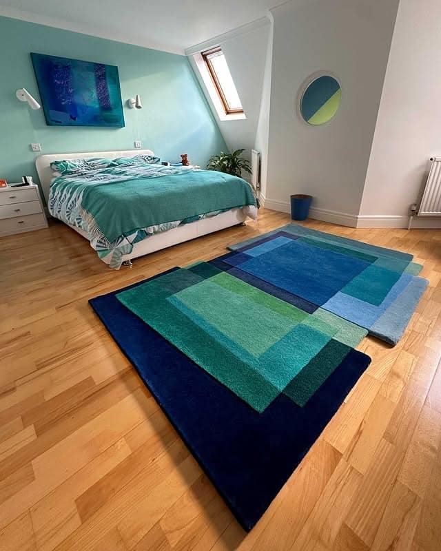 7. Geometric Turquoise Rugs for Layered Impact - turquoise bedroom ideas