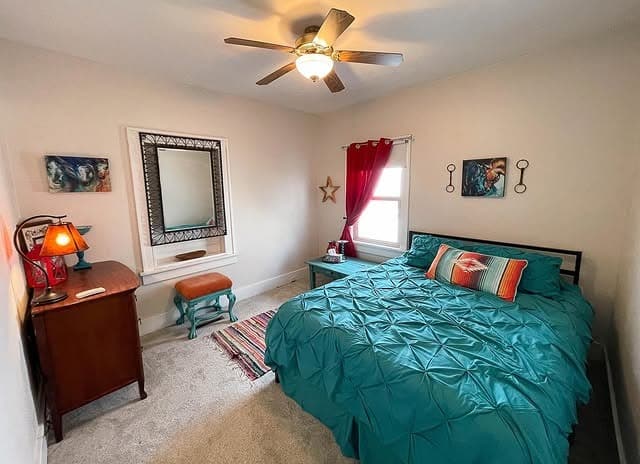 14. Teal Bedding with Warm Eclectic Accents - turquoise bedroom ideas