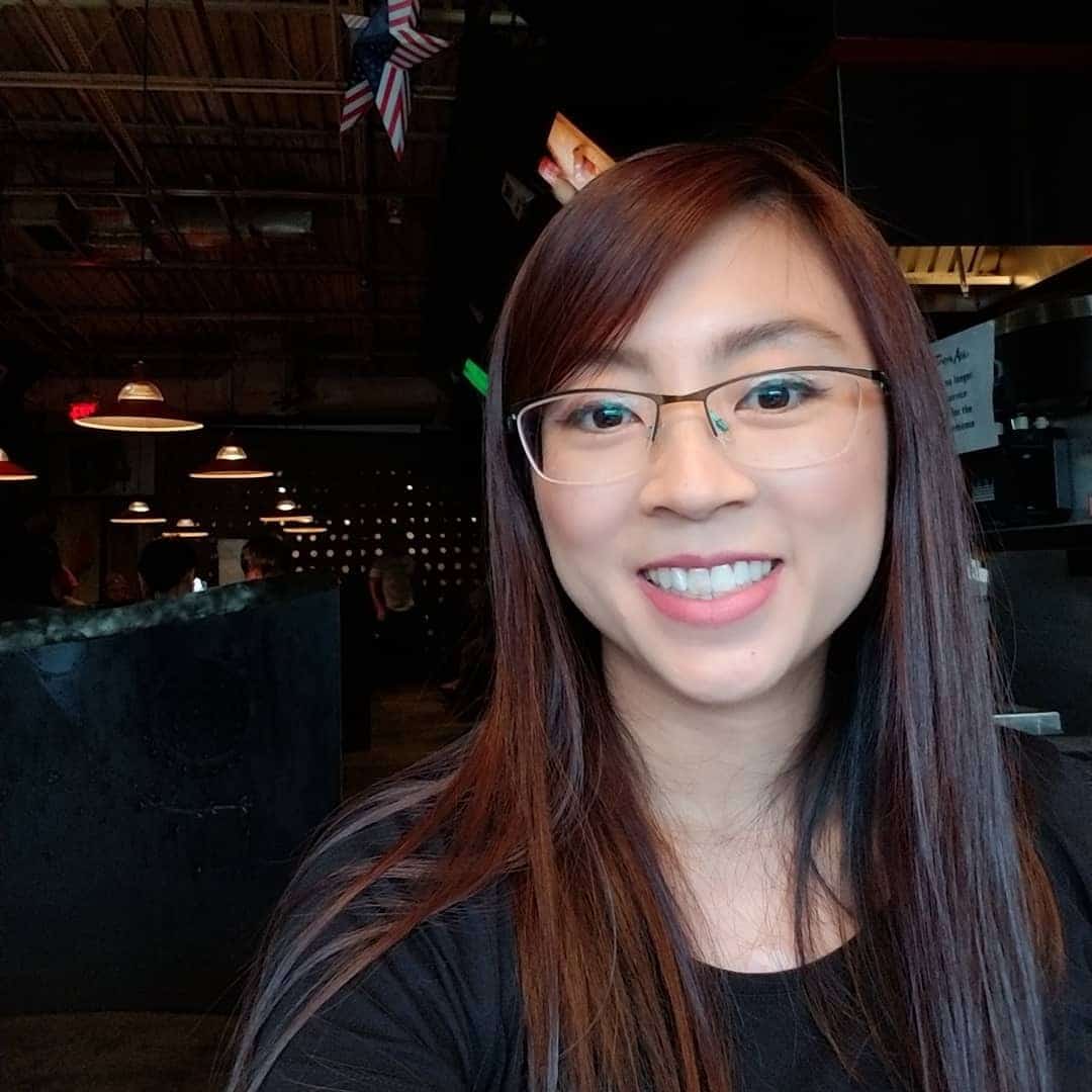 4. Straight Mahogany Burgundy with Side Sweep - Dark Burgundy Hair Color