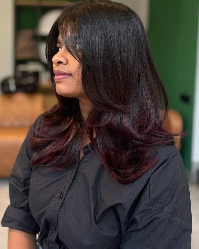 22. Long Feathered Layers with Deep Burgundy Ends - Dark Burgundy Hair Color