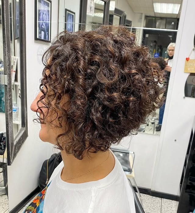 8. Structured Curly Bob in Rich Dark Brown - Short Curly Hairstyles