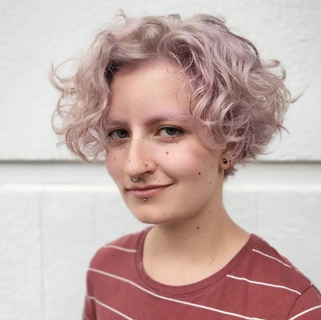 9. Textured Curly Crop in Soft Pastel Pink - Short Curly Hairstyles