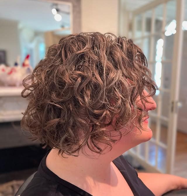 11. Layered Curly Bob in Smoky Ash Brown - Short Curly Hairstyles