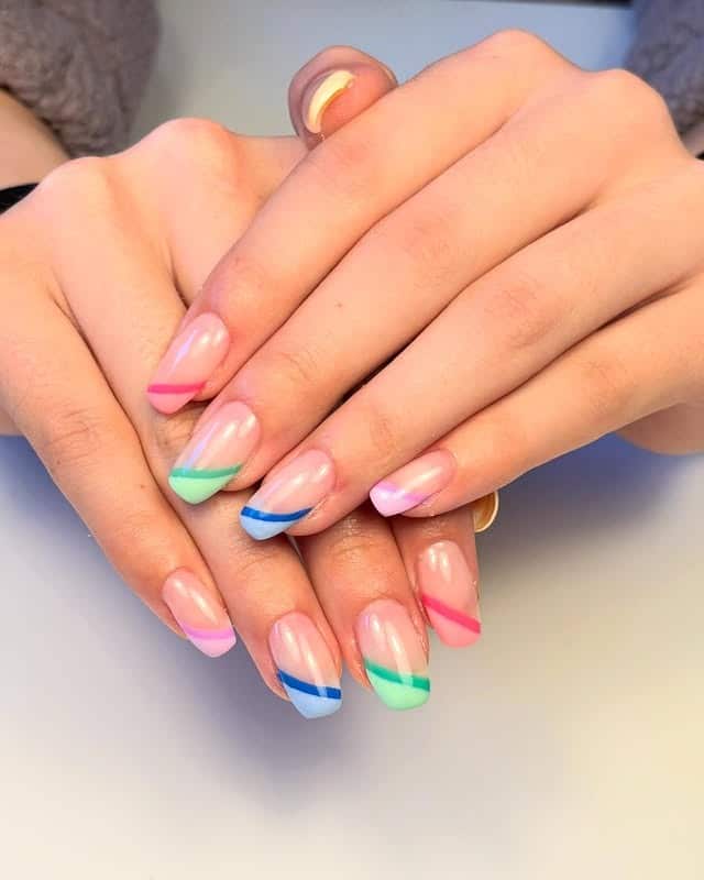 11. Pastel Diagonal French Almond Tips - bright spring nail ideas