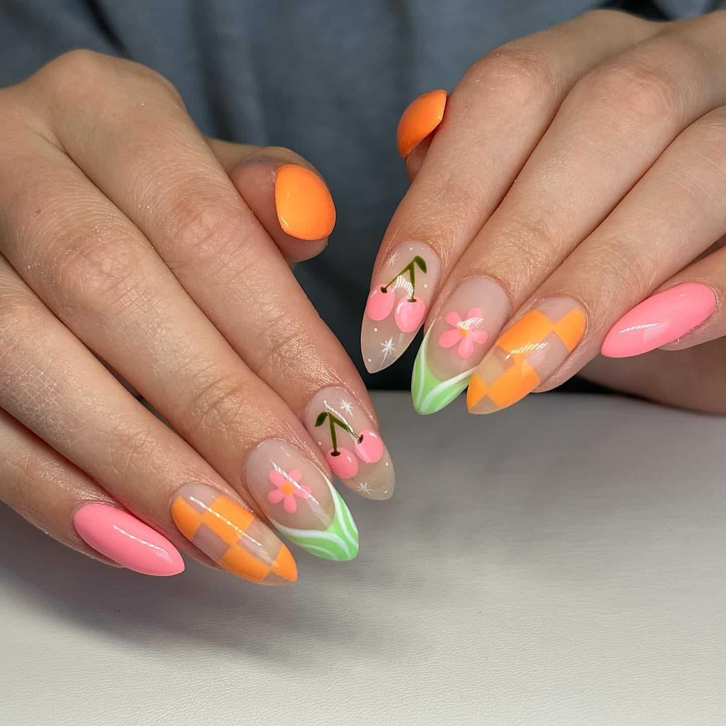 13. Spring Mix Art Almond in Pink, Orange, and Green - bright spring nail ideas
