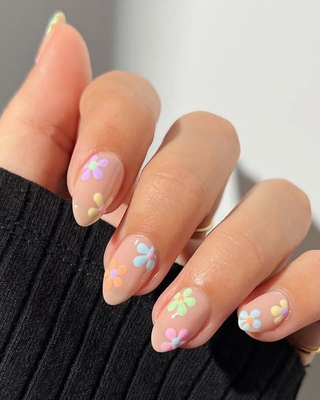 21. Pastel Daisy Almond on Sheer Nude Base - bright spring nail ideas