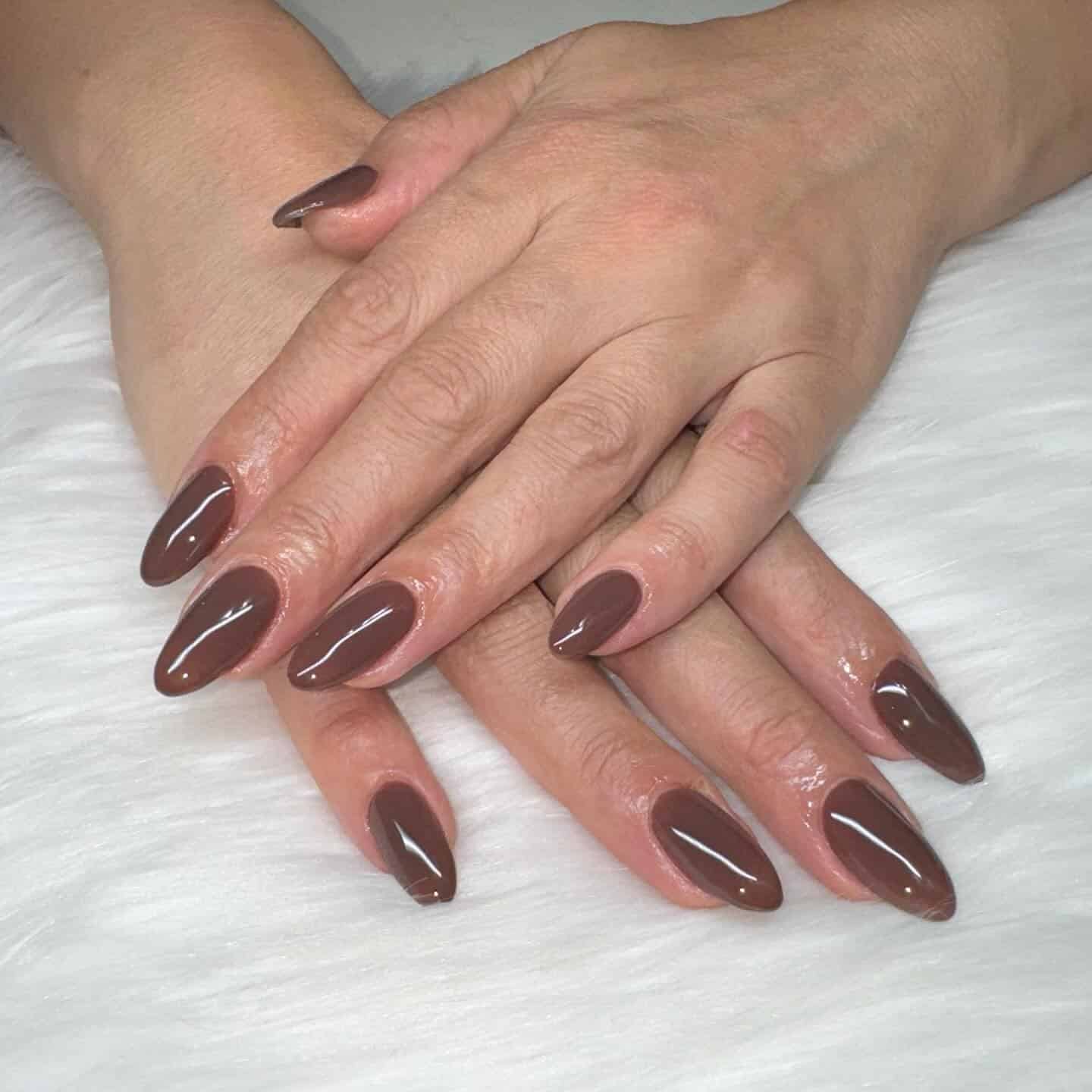 13. Taupe-Mocha Classic Almond Nails - brown almond nail ideas