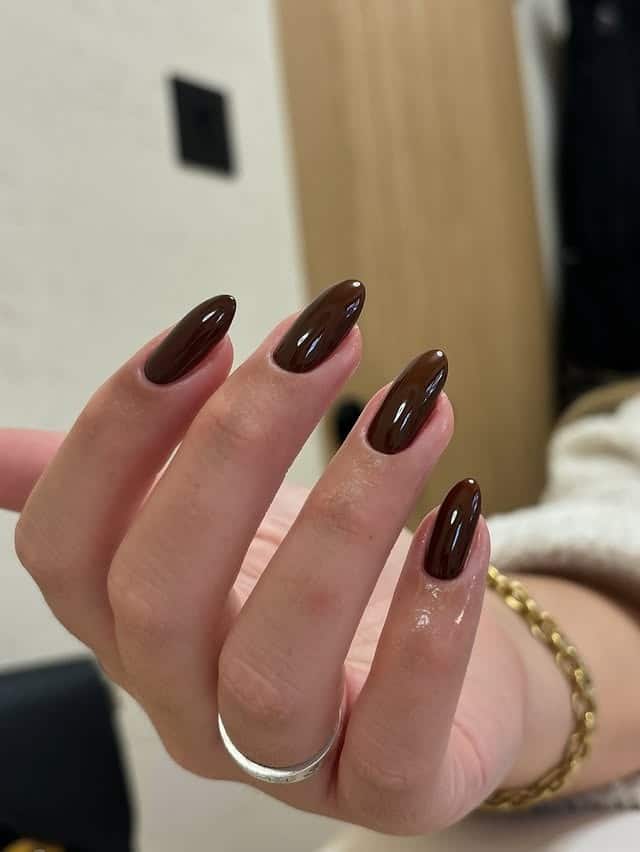 18. Espresso Brown Long Almond Nails - brown almond nail ideas