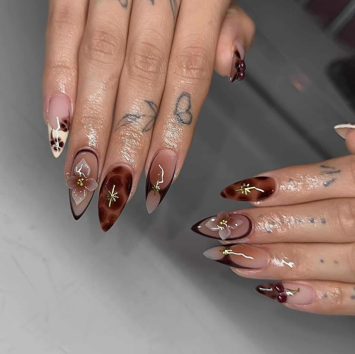 22. Tortoiseshell French Almond Nails with Floral Accents - brown almond nail ideas