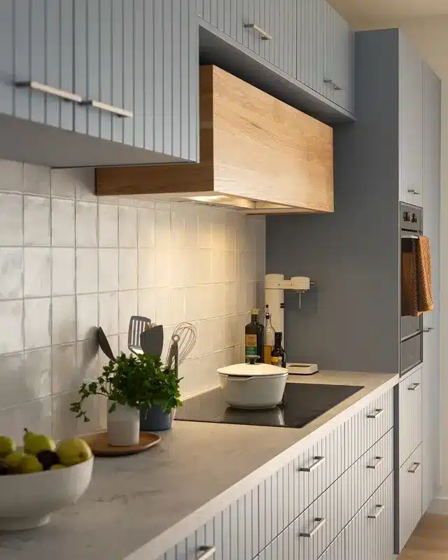 9. Soft Grey Ribbed Cabinet Kitchen with Light Oak Accents - unique kitchen ideas