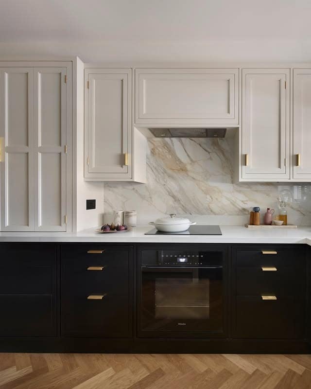 22. Cream and Black Classic Kitchen with Marble Feature Splashback - unique kitchen ideas