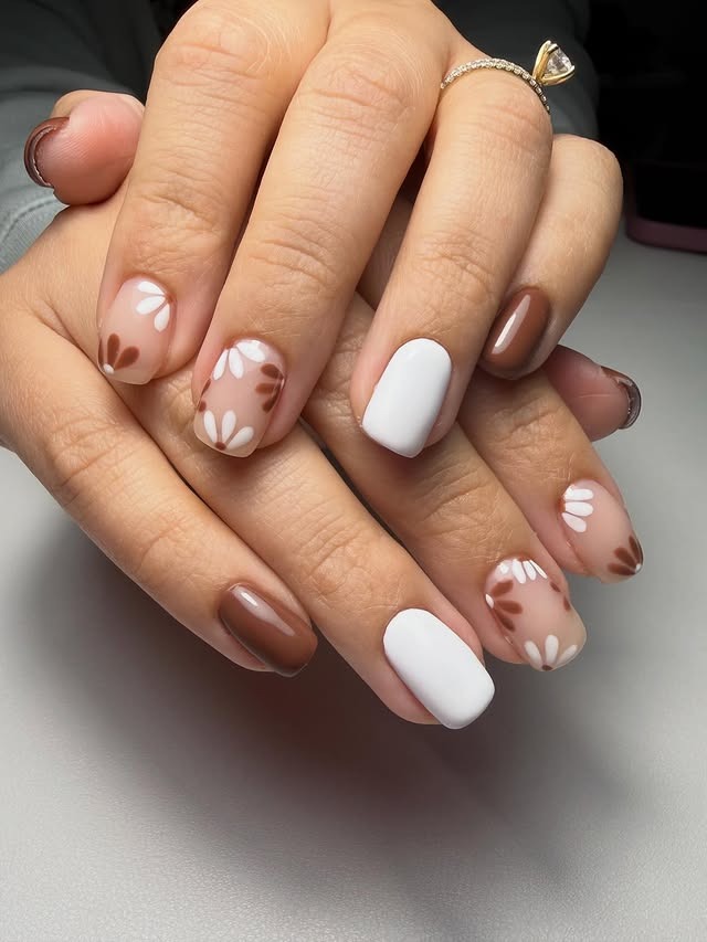 2. Chocolate Daisy Accent Nails - brown and white nail ideas