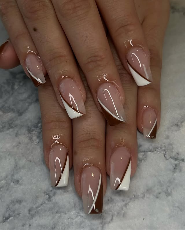 4. Glossed Caramel Diagonal French - brown and white nail ideas