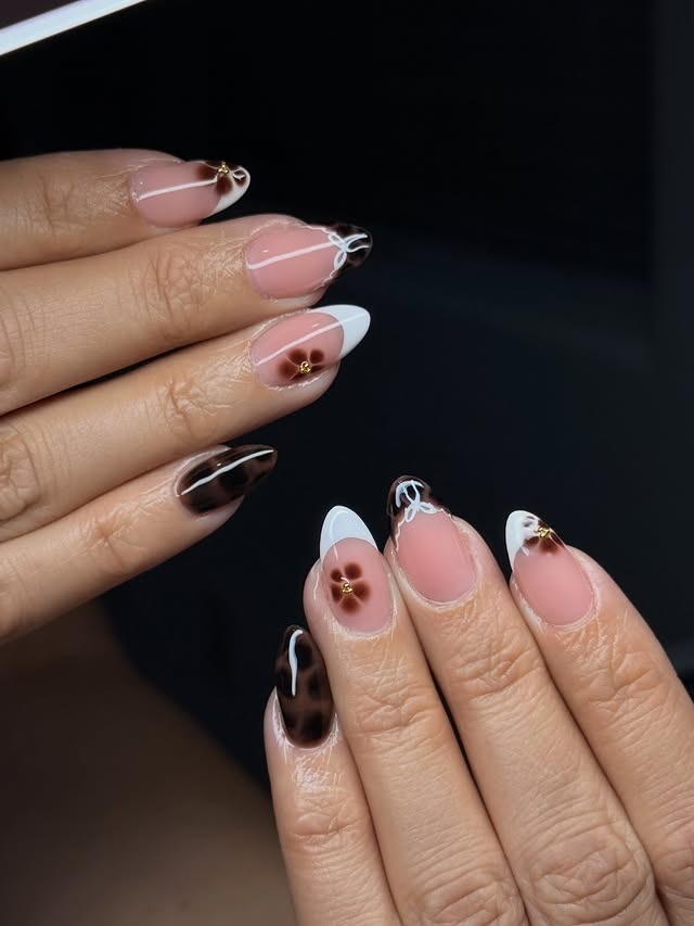 18. Almond Cocoa French with Micro Florals - brown and white nail ideas