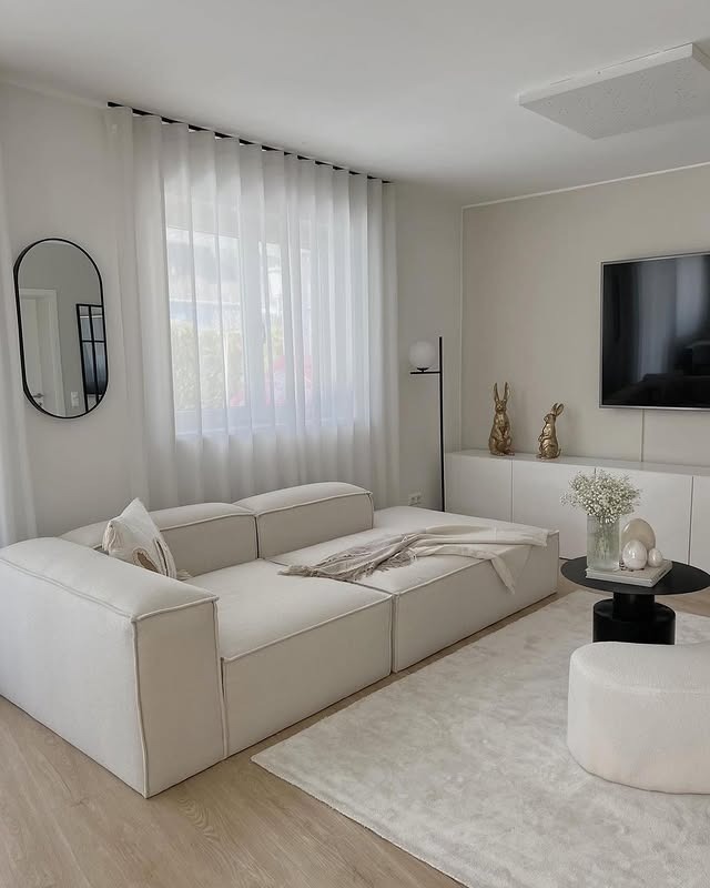 18. Streamlined White with Minimal Decor - white living room ideas