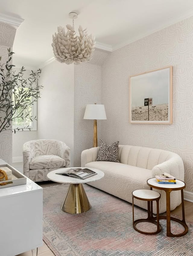 22. Elegant White with Subtle Pattern and Brass Details - white living room ideas