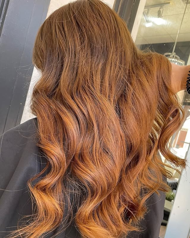 5. Dimensional Golden Brown Curls - Golden Brown Hair Color