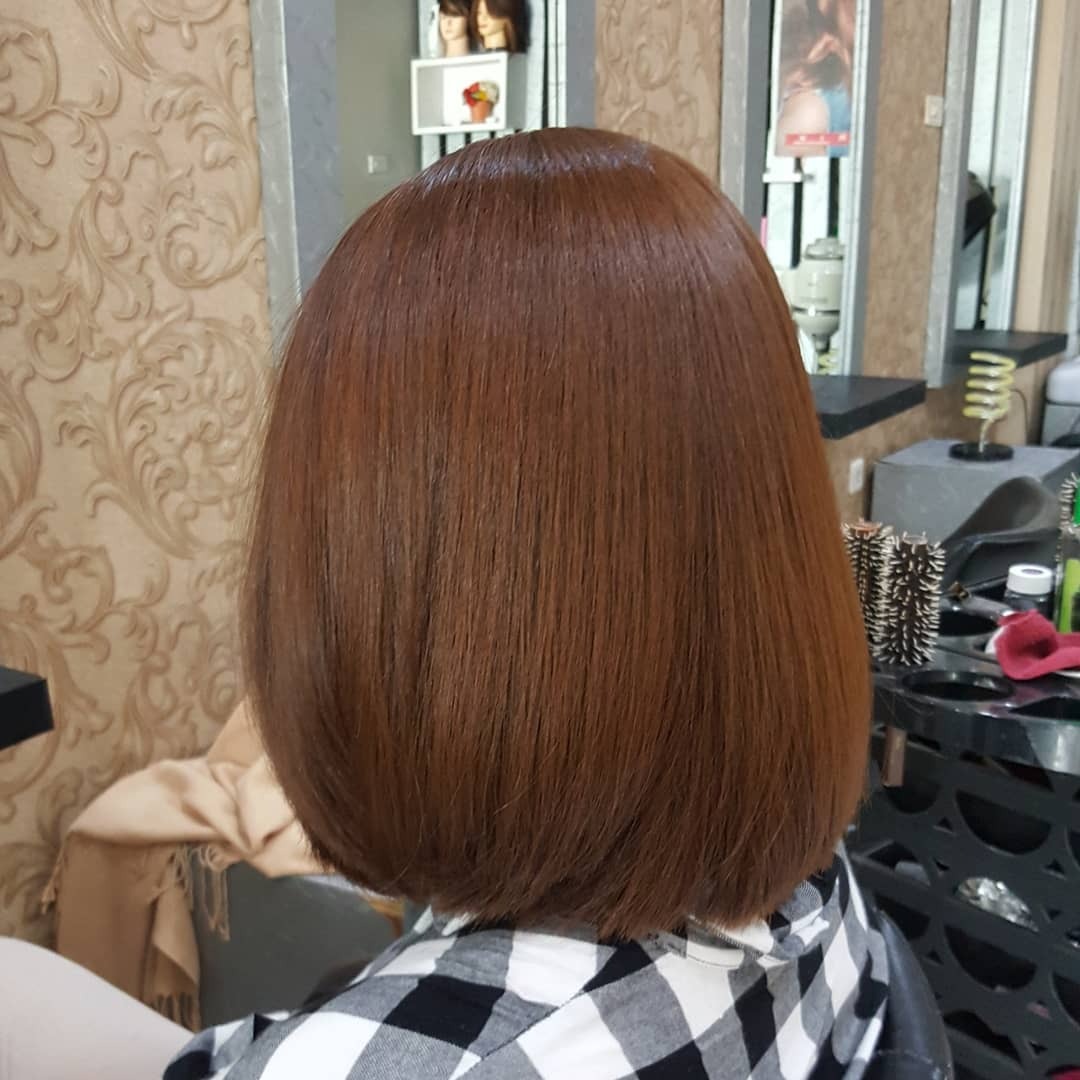 14. Sleek Golden Brown Classic Bob - Golden Brown Hair Color