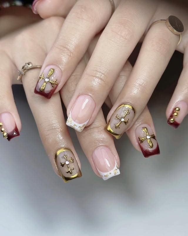 19. Burgundy French Square Nails with Gold Cross Embellishments - burgundy and gold nail ideas