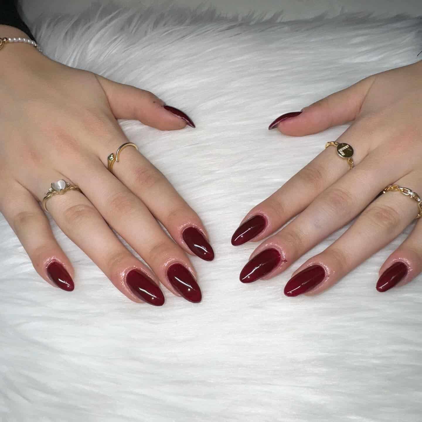 2. Classic Oxblood Almond Nails - burgundy fall nail ideas