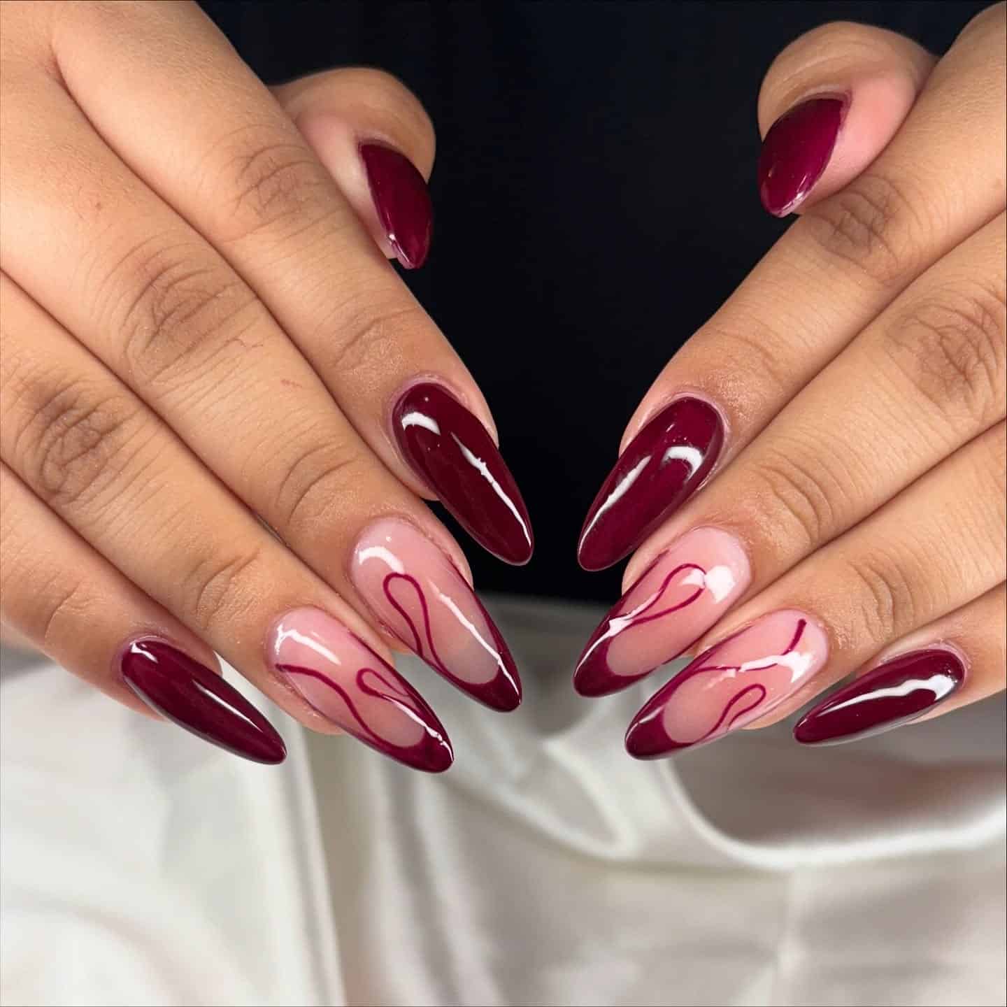 10. Dark Burgundy Almond Nails with High Shine - burgundy fall nail ideas