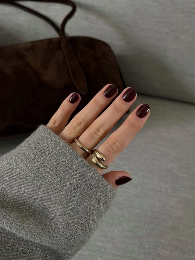 22. Short Oval Dark Wine Nails - burgundy fall nail ideas
