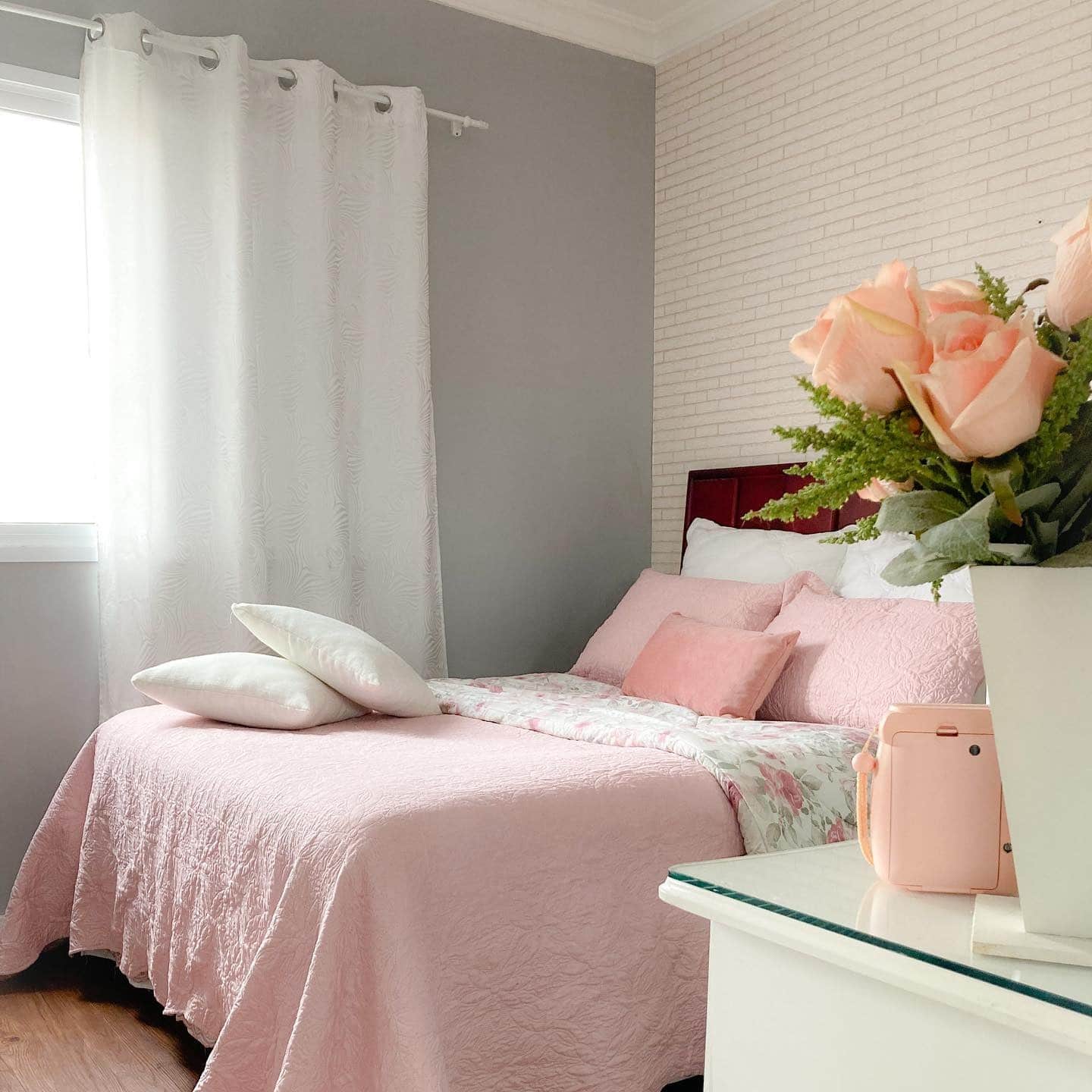 11. Soft Blush Bedding with Cool Grey Accent Wall - pink and grey bedroom ideas