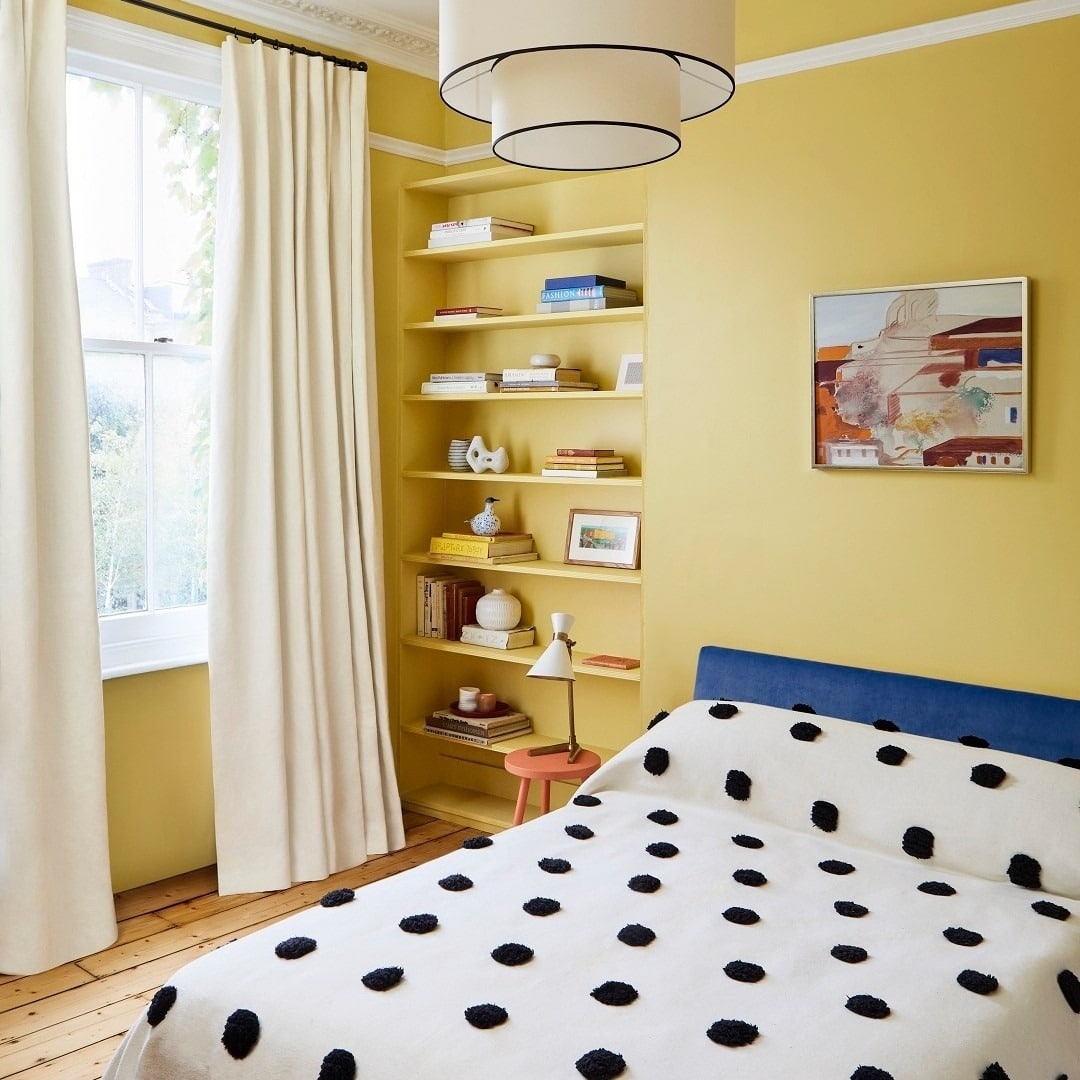 5. Modern Built-In Bedroom in Soft Lemon Yellow - yellow bedroom ideas
