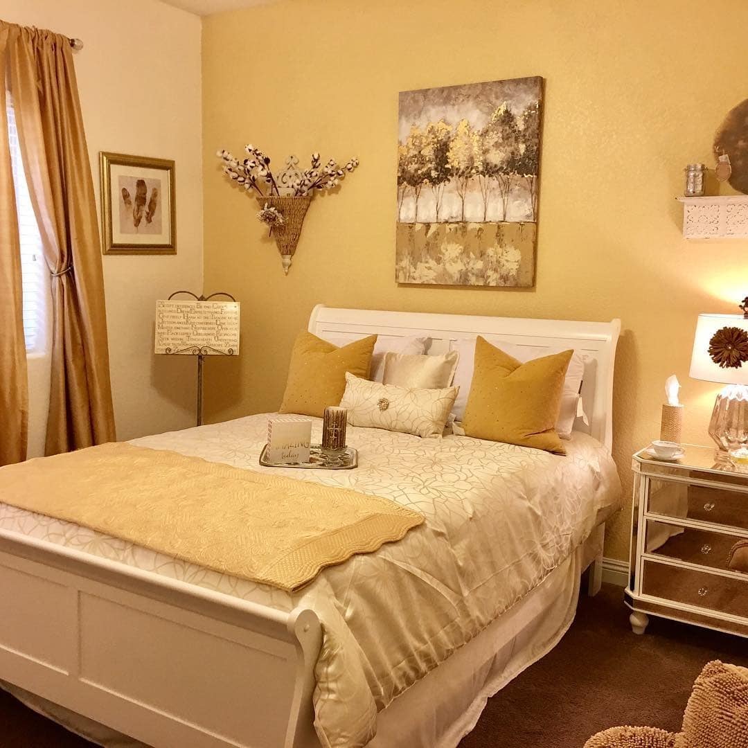 12. Traditional Comfort Bedroom in Warm Vanilla Yellow - yellow bedroom ideas