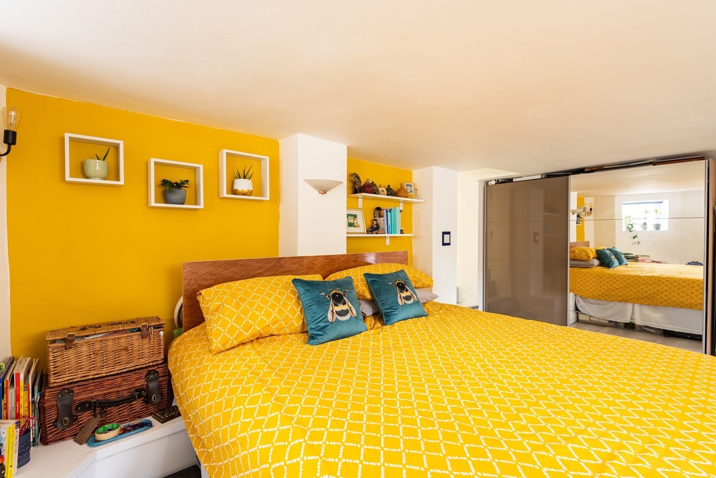 13. Contemporary Accent Wall Bedroom in Bold Marigold Yellow - yellow bedroom ideas