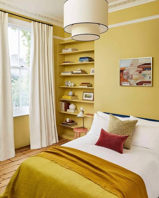 15. Built-In Shelving Bedroom in Golden Straw Yellow - yellow bedroom ideas