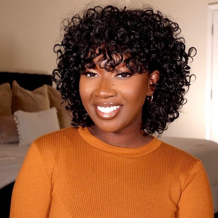 16. Natural Black Curly Bob with Curly Bangs - Curly Bob Hairstyles