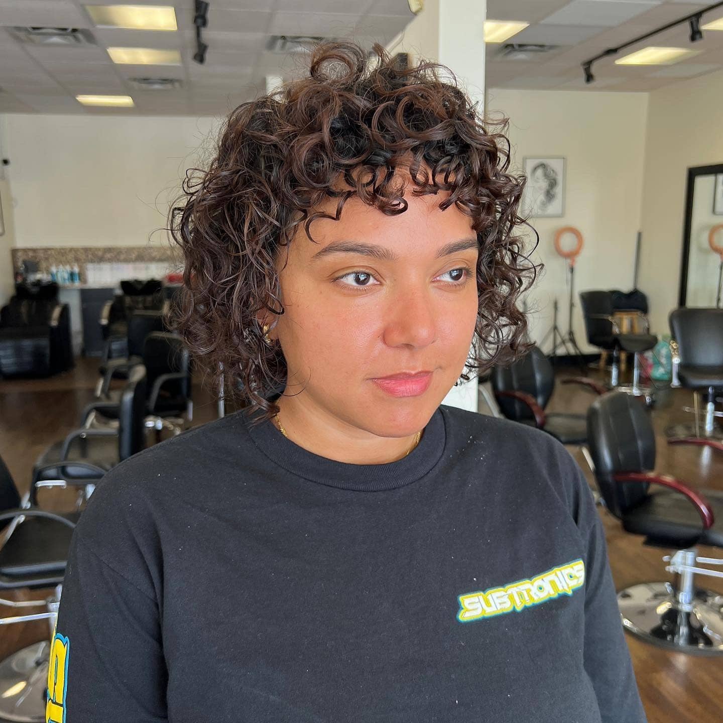 17. Espresso Curly Shag Bob with Textured Fringe - Curly Bob Hairstyles